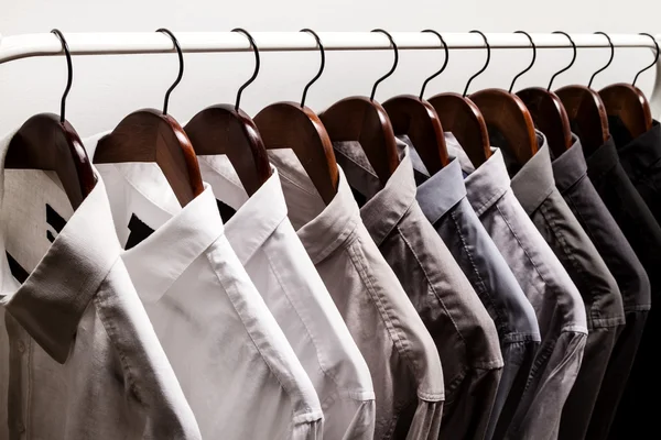 Several shirts on a hanger — Stock Photo, Image